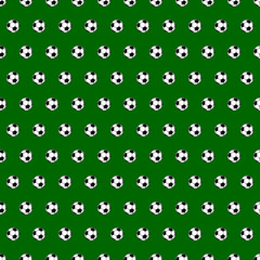 Wall Mural - Seamless pattern of small soccer balls on green background.