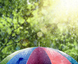 Fototapeta Tęcza - Summer rain with sunshine on colorful umbrella 3D Rendering