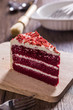 delicious baked dessert : fresh slice red velvet cake with tasty cream
