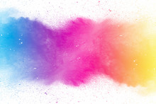 Explosion Of Multicolored Dust On White Background.