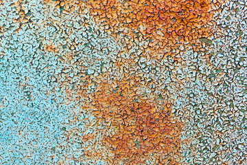 background fo rusty painted iron. texture of old rusty sheet of iron with crumbling paint. rusty met