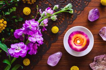 Purple Stones, Flowers and Candle