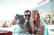 © Nebojsa - Young man is taking selfie with his girlfriend while having ice-cream in cone