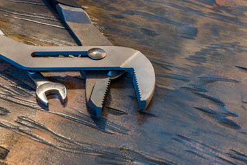 Two wrenches on wood