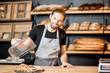 © rh2010 - Bread seller working at the bakery shop