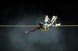 © Andrii IURLOV - Athlete in action of high jump.