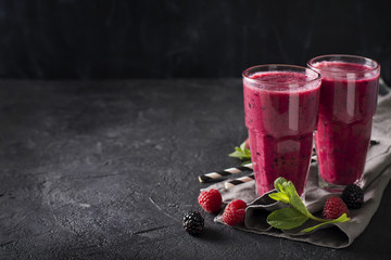 Wall Mural - Blackberry and raspberry smoothies in glass with mint leaf and raw beeries