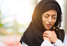 Young Arab Woman Wearing Hijab Crying Depressed Full Of Sadness Expressing Sad Emotion