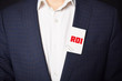 © Майя Руднева - Businessman shows business card with the inscription:ROI