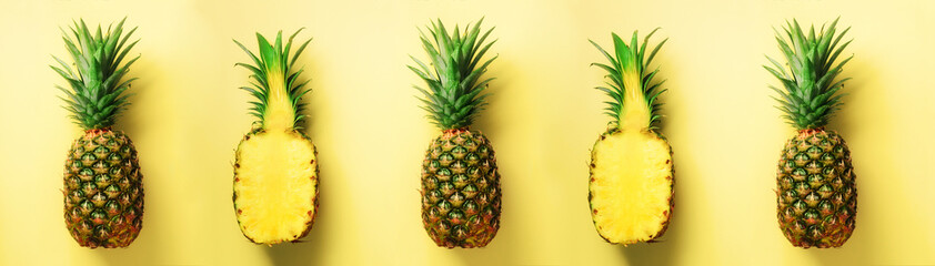 Wall Mural - bright pineapple pattern for minimal style. top view. pop art design, creative concept. copy space. 