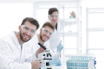 Wall Mural - closeup.a group of scientists in the workplace.