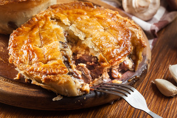 Sticker - Fresh beef stew pie on a cutting board