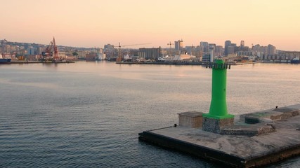 Wall Mural - navigation to the port of Naples at dawn view of the lighthouse of the port and moored ships