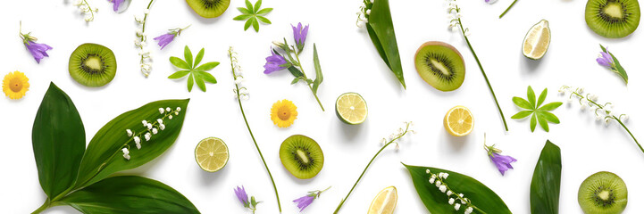 Wall Mural - pattern from plants, wild flowers, lily of the valley, fruit kiwi, isolated on white background, flat lay, top view. The concept of summer, spring, Mother's Day, March 8. 