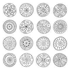 Wall Mural - a set of doodle mandalas. hand-drawn round decorative elements in ethnic style. vector illustration.