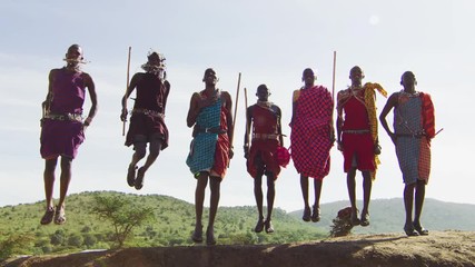 people performing a traditional jumping dance