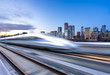© THINK b - high speed train with cityscape