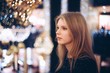 © Vladimir - Art portrait of a beautiful pensive girl. gorgeous blonde girl, portrait in shopping cnter lights.
