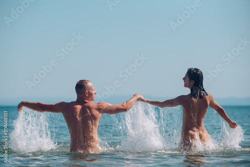 Free Beach Vacation Nude - Couple in love with sexy body relax on beach. Summer ...