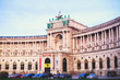 View of Austrian Library building facade exterior, established in 18th century, Hofburg Palace, Vienna, Austria, summer sunny day 