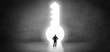 © ra2 studio - Businessman standing alone in front of a big keyhole