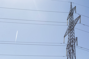 Electricity pillar high voltage line, blue sky background