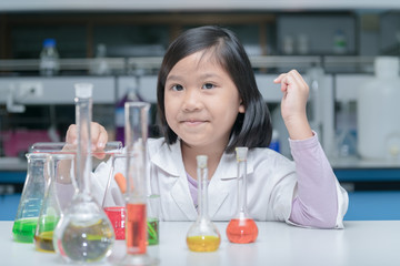 Wall Mural - happy little scientist making experiment