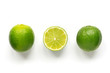 Isolated limes. Row ripe citrus on white background. 