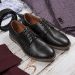 © Object Studio - Set of male stylish clothes on wood background