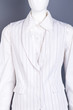 © DenisProduction.com - White shirt and waistcoat for women. Female sleeveles formal style vest on dummy. Exclusive apparel for women.