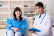 © Elnur - Male doctor checking up female patient in hospital
