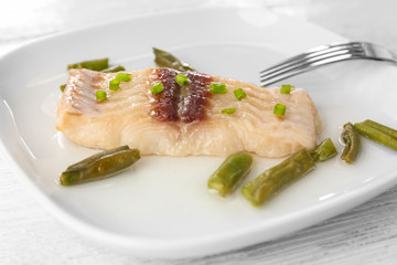 Sticker - Plate with tasty fish and green beans on table