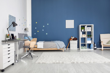 Poster - Modern child room interior with comfortable bed and desk