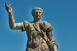 Rome, Bronze statue of emperor Caesar Nervae Trajan, Forum of Caesar Nervae Trajan in the background