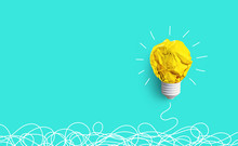 Creativity Inspiration,ideas Concepts With Lightbulb From Paper Crumpled Ball