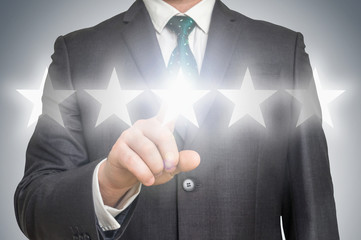 Businessman is giving a five stars rating - ranking concept