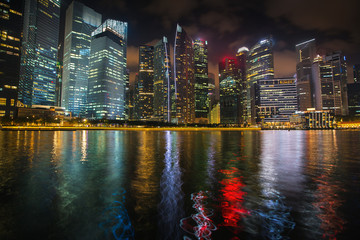 Wall Mural - View of the business district Marina Bay at night in Singapore.