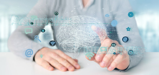 Man holding a 3d rendering artificial intelligence concept with a brain and app
