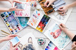 © golubovy - art painting inspiration creativity concept. artist creations. watercolors and drawings color swatches and brushes scattered on the floor