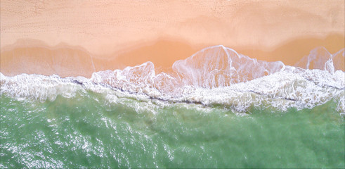 Wall Mural - Aerial view of tropical sandy beach and ocean. Copy space