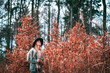 © leszekglasner - Beautiful girl with vintage camera in golden autumn forest