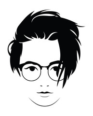 Wall Mural - The head of a beautiful girl with glasses. Face of a young woman with a female hairdo.