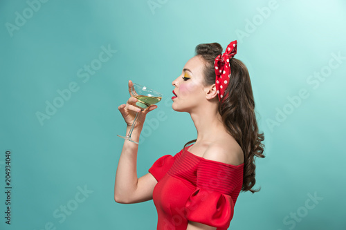 Beautiful young woman with pinup make-up and hairstyle Canvas Print