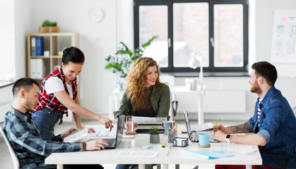 Wall Mural - business, technology and people concept - creative team or designers working on user interface at of