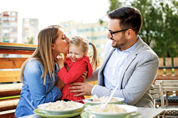 Family enjoying pasta