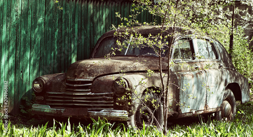 An old rusty abandoned car outdoors broken © katafree
