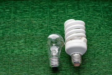 Light bulb on green background. Minimal concept. Copy space