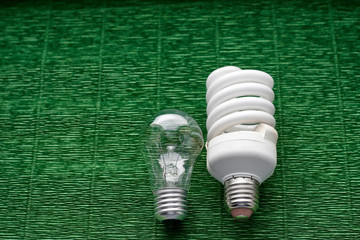 Light bulb on green background. Minimal concept. Copy space