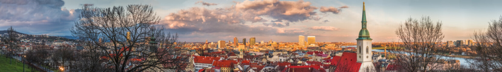 Wall Mural - Panoramic View of Cityscape of Bratislava, Slovakia with St. Martin's Cathedral at Sunset