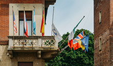 Hotel Balcony With Various Flags Of Different Nationalities
